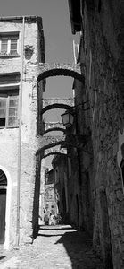 archi, vicolo, bianconero, lampione, finestre, pietre, persone, ombra, strada, paese